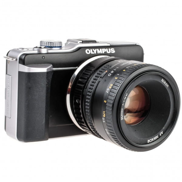 Quenox Fokalreduktor-Adapter für Nikon-F-Objektiv an Micro-Four-Thirds-Kamera (mit Blendenring)